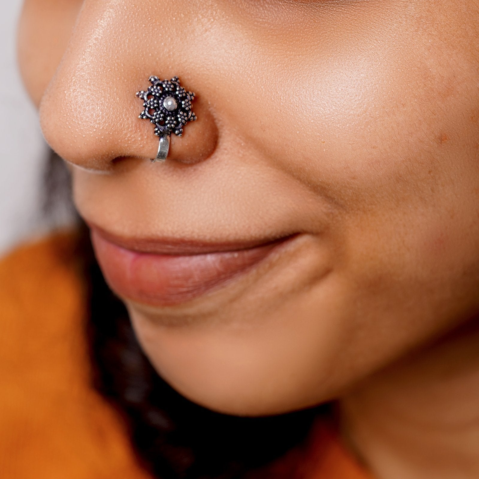 Gauri White Stone Floral Nose pin